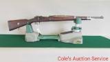 Spanish rifle chambered + 7.92 x-5 7 mm. Dated 1946, 23.62 inch barrel, serial number e 8334, 1942