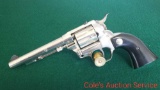 Hi standard double nine 22 caliber handgun. Nickel finish, 9 shot, bucheimer leather holster, dated