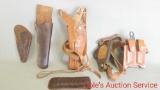 Large group of miscellaneous holsters including a Blackhawk 357 holster.