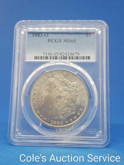 1883-o United States Mint Morgan silver dollar. Graded ms-65 by PCGS. na