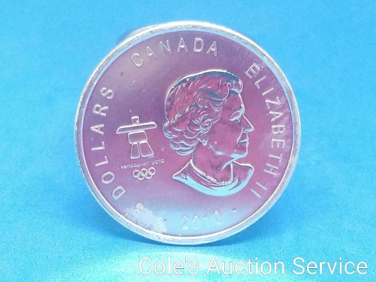 2010 Canadian silver dollar. Ungraded but has a beautiful mirror like finish. Great for any coin