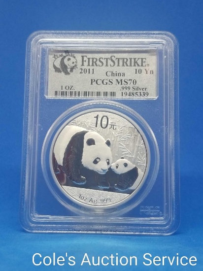 2011 Chinese first strike 1 oz silver coin. Beautiful coin graded MS70 by PCGS.