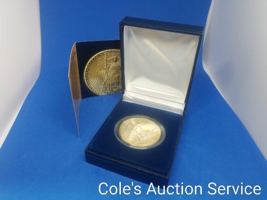 $20 replica tribute gold coin in display box. See photos for details.