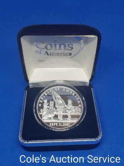 Land of the Free one troy ounce silver coin in display box. Beautiful mirror-like finish.