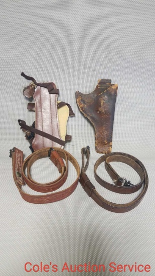 Pair of vintage military rifle slings, a leather holster, and a leather archery arm guard.