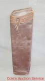 Antique leather archery quiver manufactured by Bear archery company.