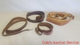 Lot of 4 vintage military style leather gun slings. See photos for details.