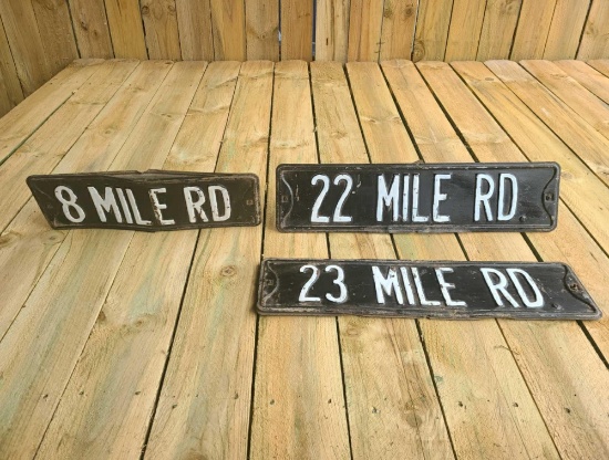 Heavy 2 sided street signs in good condition.