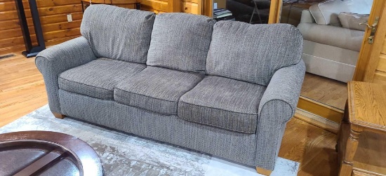 Extra comfortable living room couch that measures approximately 84 in wide and 35 in deep. In great