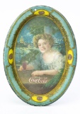Oval Coca-Cola advertising tip tray