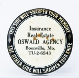 Oswald Agency celluloid advertising item