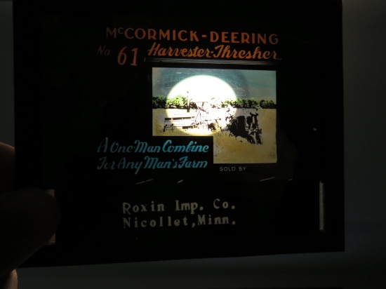 Roxin Implement Co - Projector Slide of a thresher