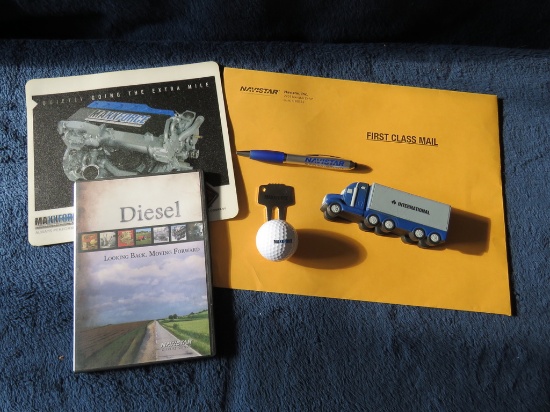 Bundle - Navistar Engine - DVD, envelope, golf ball, squeeze toy, pen, mouse pad
