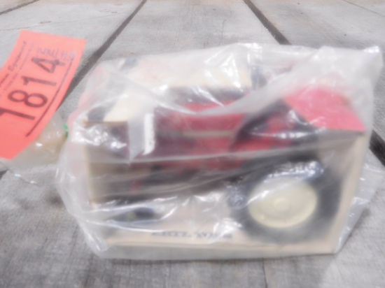 RED IH MINI TOY TRACTOR IN BOX