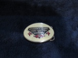 White enamel McCormick Deering belt buckle
