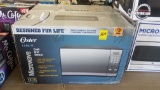 Oster Microwave 1.3 Cu. Ft. 1000 Watts- Cook, Grill, Reheat