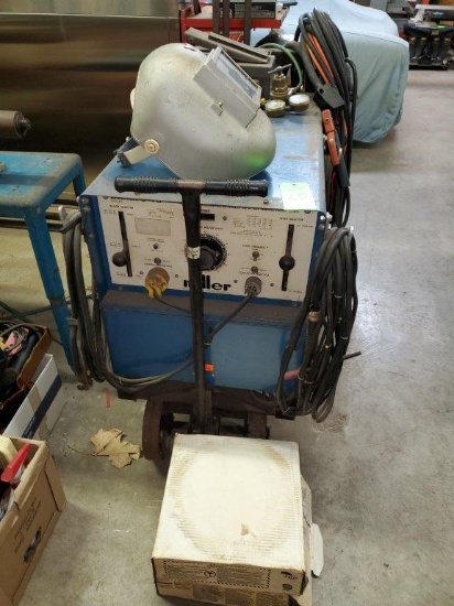 Miller Arc Welder with Welding Helmets & 2 Boxes of Spool Arc