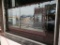Wood & Glass Display Counter in Front Window