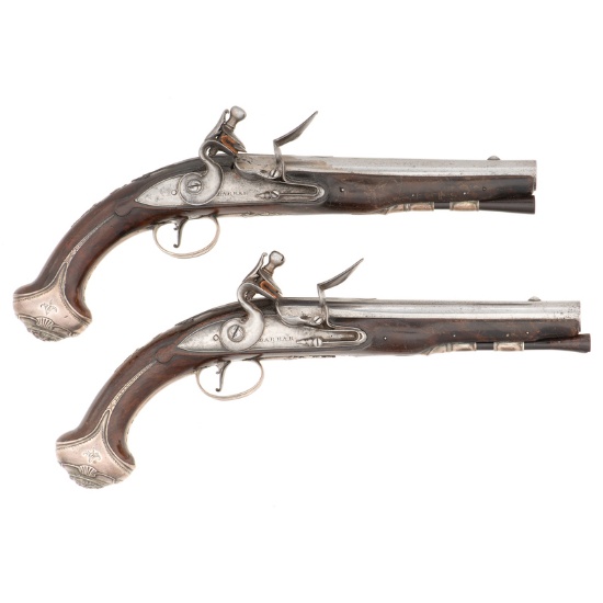 Pair of Silver Mounted Early English Flintlock Pistols by Barbar