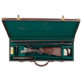 * Cased Relief Engraved Superimposed August Jung Two Barrel Rifle/Shotgun Set