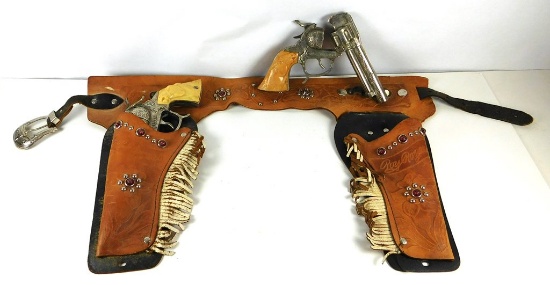 1950’s Roy Rogers Double Six-ShooterHolster Set with beige grips.    SIZE: