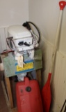 1998 Johnson 15 HP boat motor w/plastic gas can and oar