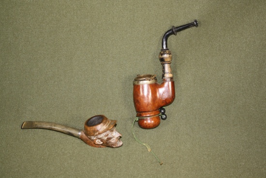 (2) antique pipes (one with carved soldier’s head)