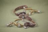 Vintage cowboy spurs with horse head