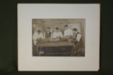 1909 photo of medical students dissecting cadaver