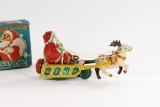 1950’s wind-up “Mechanical Santa Claus with bell”