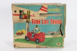 1950’s battery-op “Fork Life Truck” by Modern Toys