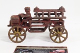 Antique cast iron fire engine ladder truck