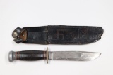 Antique Marbles hunting knife with leather sheath.