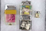 Group of (4) Pin-Up Cigarette Lighters