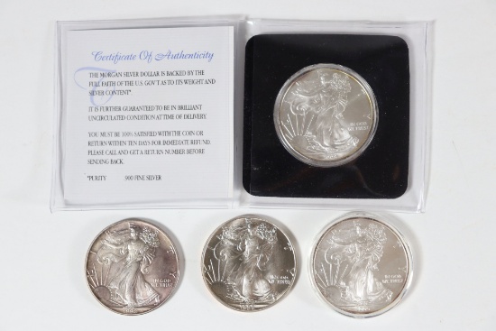 Group of (4) 1oz Silver Eagles