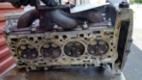 SAAB Cylinder Head and Tote Bin of Turbo Engine Parts