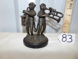 Solid Brass Monkeys Playing Saxophone & Trumpet