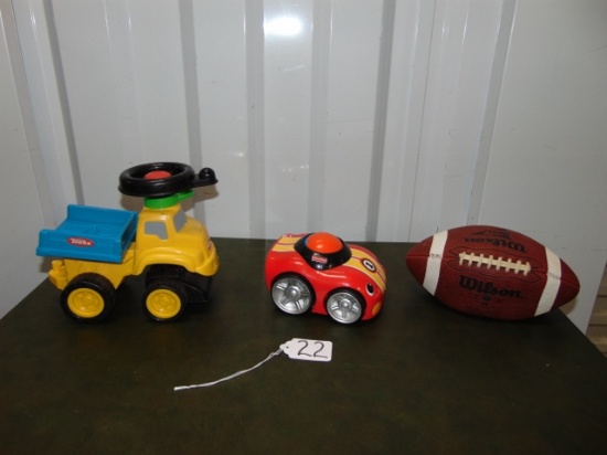 Child's Lot: Plastic Tonka Truck, Fisher Price Battery Powered Car And A Wilson