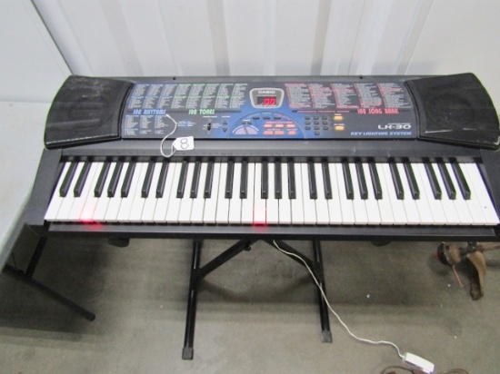 Nice Casio L K-30 Electronic Keyboard W/ Key Lighting System And 100 Song Bank (Local Pick Up Only)