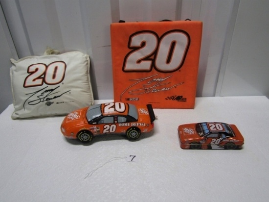 Tony Stewart Lot: 2 Cushions, A Car Pillow, Cap And A Tin