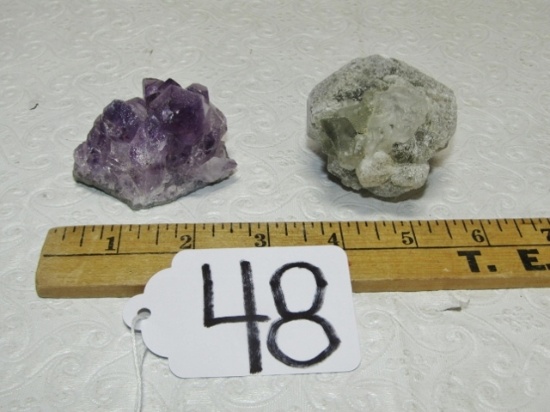 Amethyst Geode And Uncracked Clear Crystal Geode