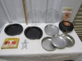 2 Baker's Secret Pans, 4 Aluminum Baking Pans, 2 Grills, A Decorating Set,