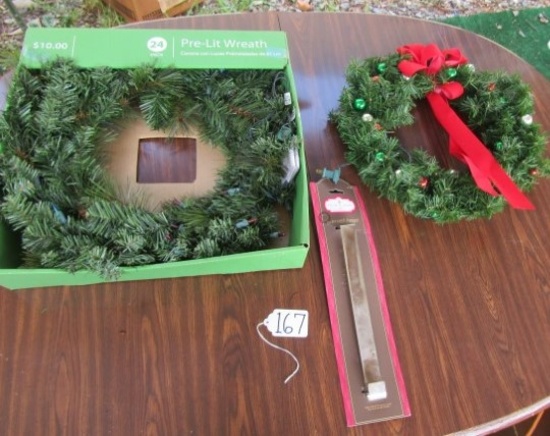 2 Never Used Lighted Christmas Wreaths And 1 Wreath Holder   (LOCAL PICK UP ONLY)
