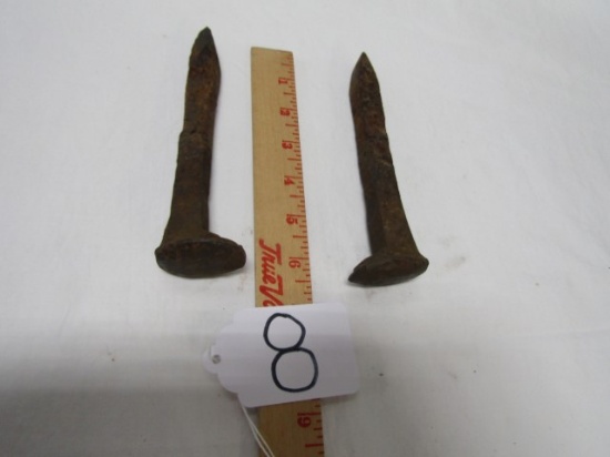 Two 6 1/2" Cast Iron Railroad Spikes