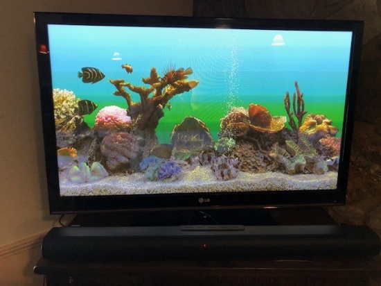 L G 42" Flat Screen Television W/ Remote Control  (LOCAL PICK UP ONLY)