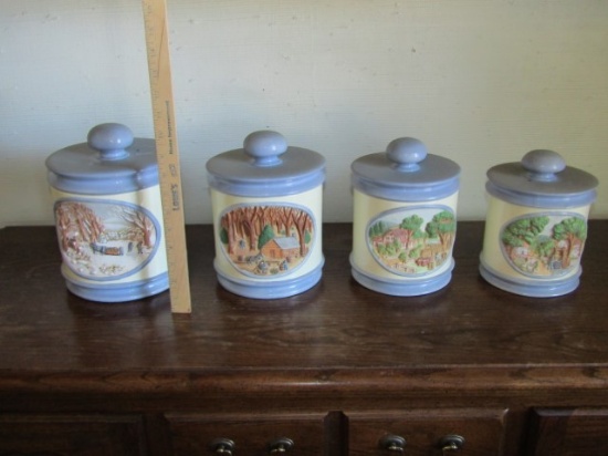 Set Of 4 Ceramic Canisters W/ Recessed Scenes