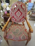 Ornate Floral Upholstered Wood Chair, Scroll Arms, Column Feet, Floral Carved Design