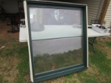 Large Glass Window in Wood Frame