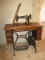 Early Singer Treadle Cast Iron Caster Base Sewing Machine in Quarter Sawn Oak Cabinet