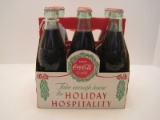 6 Coco-Cola Classic Commemorative Green Glass 6oz. Bottles w/ Cardboard Carrier